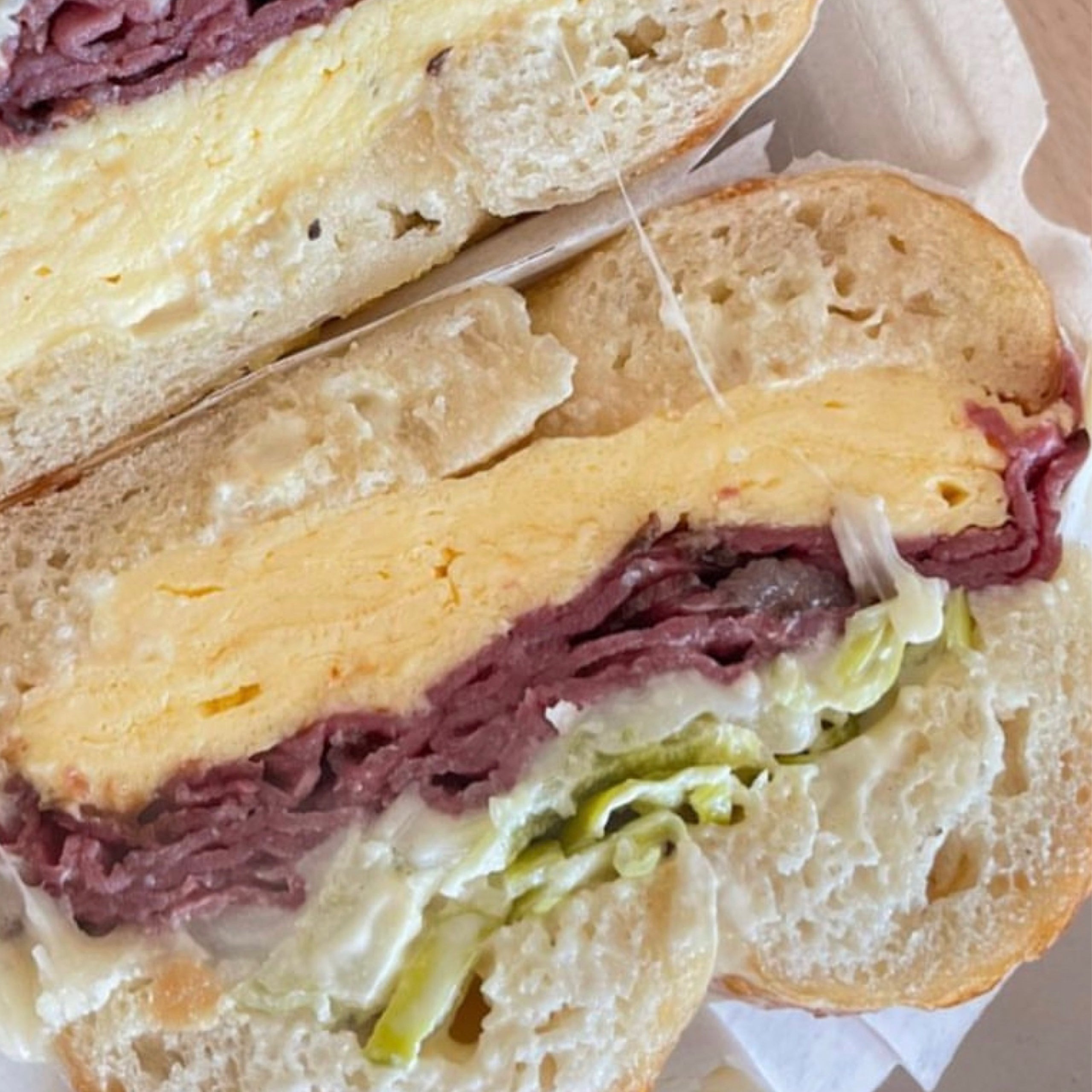 Pastrami, Egg, & Cheese Sandwich Howdy Bagel